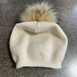 Gorgeous hat with faux fur pompom